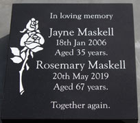 Memorial with rose image.