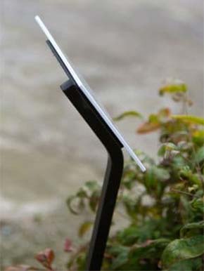 Wrought iron spike with fixing plate.