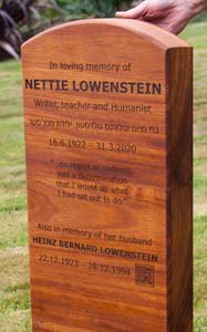 Hardwood headstone with laser engraved text.