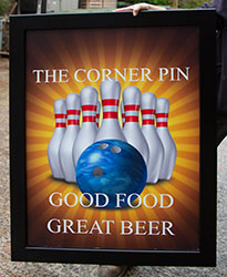 Large framed sign for a pub