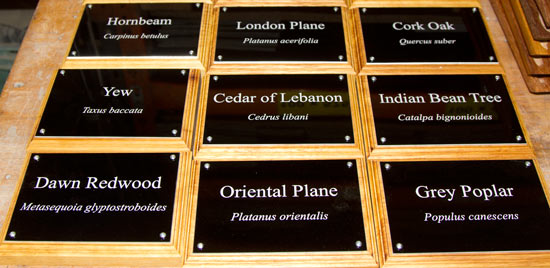 Black aluminium plaques on backing boards