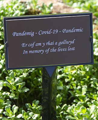 Dark bronzed anidised aluminium plaque in plaque holder.