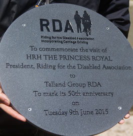 Round engraved plaque.