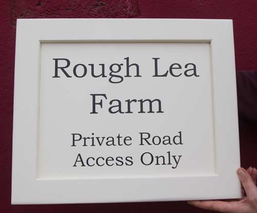 Painted framed sign