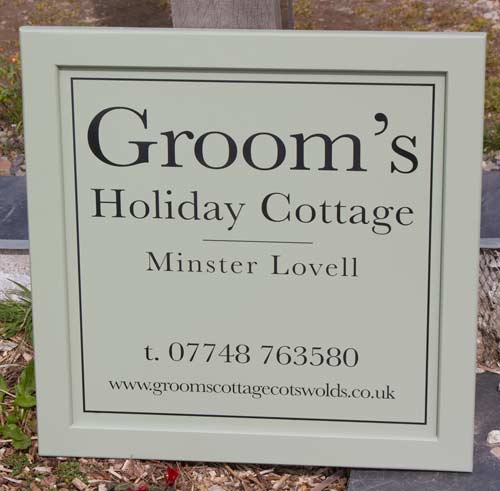 Framed holiday cottage sign