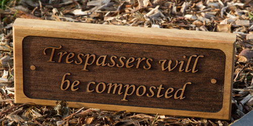 Unusual wooden sign with raised letters