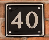 Polihed cast aluminium house number.