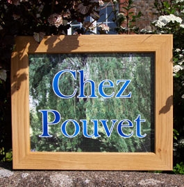 Framed house sign.