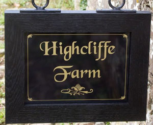 Wood framed hanging sign