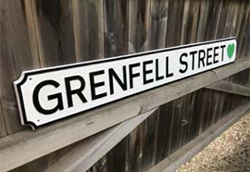 Cast metal street signs.