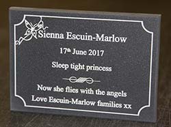 Stone-like corian memorial plaque.