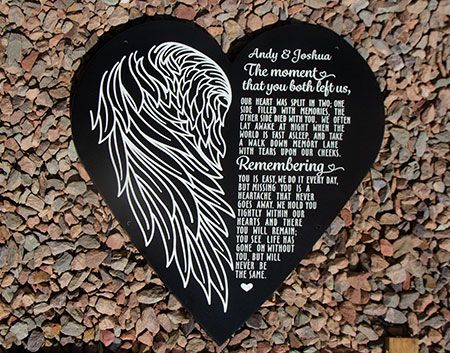 Made to order black corian memorial plaque.