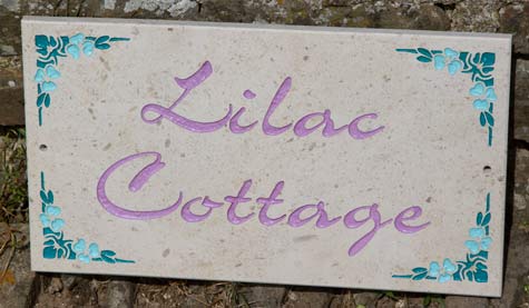 Limestone house sign