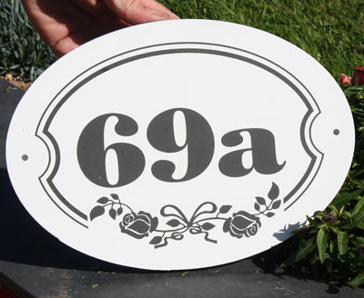 Painted slate number with detail laser etched into the slate