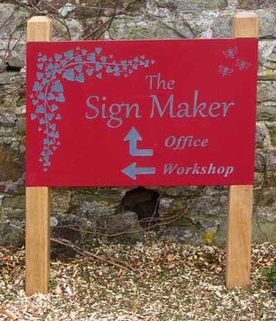 Painted slate sign inset into posts