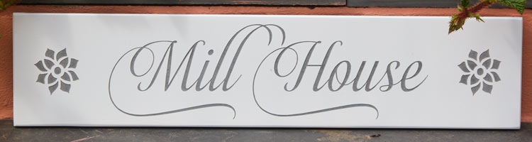 Font -Almibarswish 2. This slate house sign was created by painting the slate white and then carving out the letters