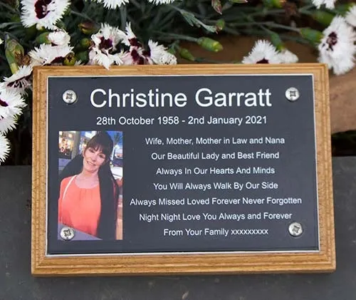 Photo memorial plaque on a backing board. Photo Memorial Plaque