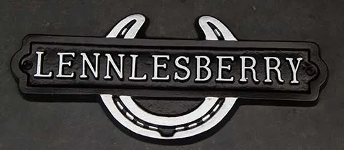 Tradionally cast house in in the shape of a horeshoe. Horseshoe House Sign