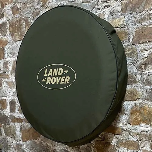 These standard Land Rover wheel covers are available in olive green or sand. Olive Green Canvas Wheel Cover