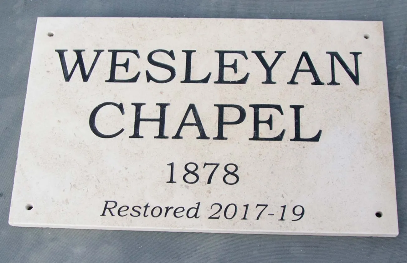 Limestone is an interesting and durable stone. Limestone House Sign