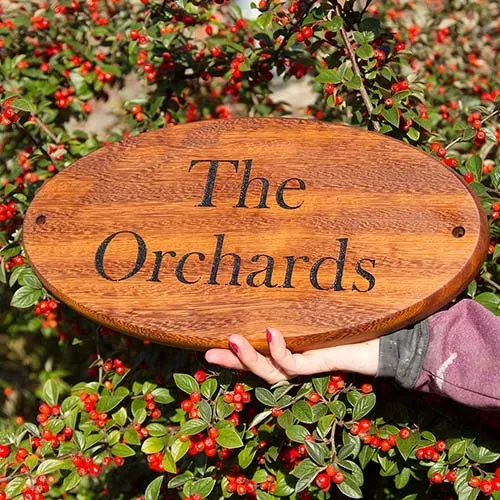 These signs are full of oil and therefore low maintenance. Iroko Wood Sign - Oval