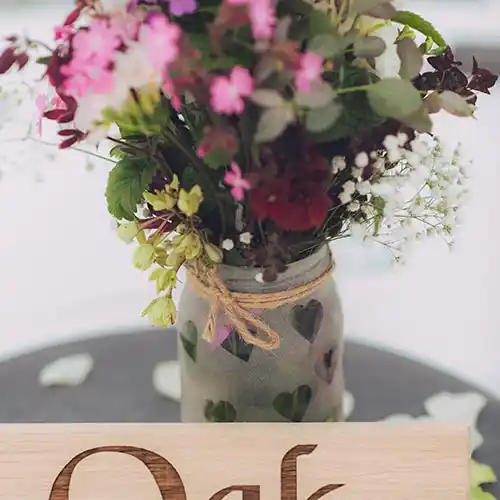 These can be design for you. Sand blasted glass jar tea light wedding table decoration