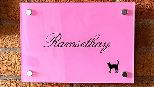 Pink vinyl on reverse of clear acrylic sign House Sign with Cat Image