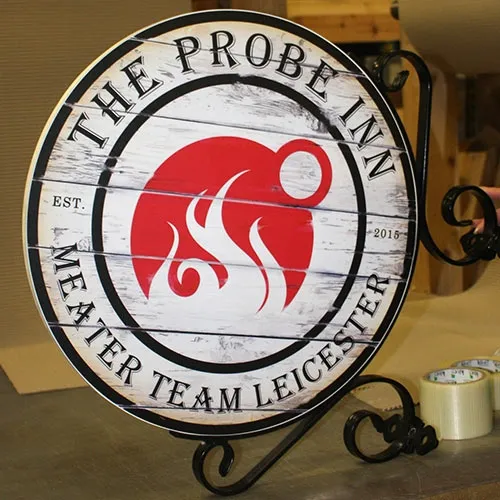 Send in your own artwork or ask our designer to put it together for you. Roun Procting Sign with Aged Wood Look Print