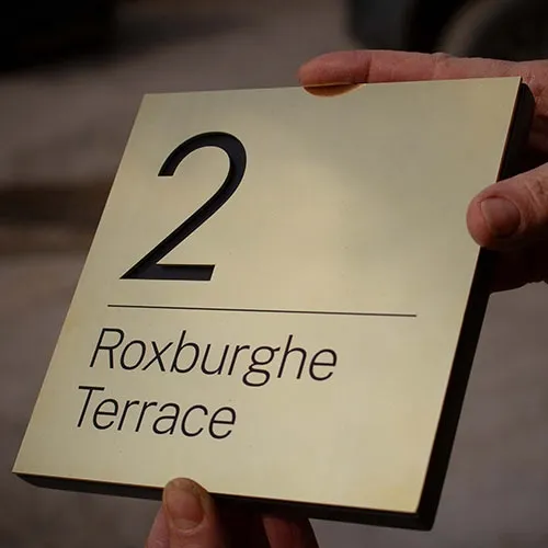 This was placed on a corian backing board which was the same size. Cut-Out Brass Address sign