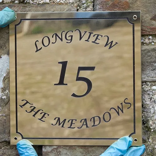 As you can see polished brass is very reflective. Engraved Brass House Sign