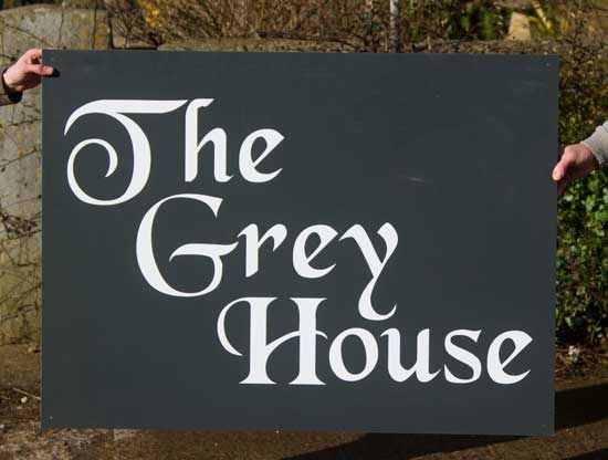 A very large house sign!