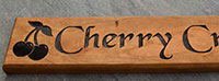 Cherry is a lovely timber for wooden signs.