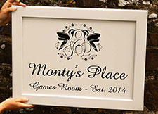 Framed wooden sign, painted in cream. Framed wooden sign, painted in cream.