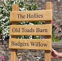 Front fixed wooden ladder sign made from oak and satin varnished.