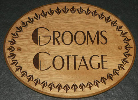 Oval wooden sign