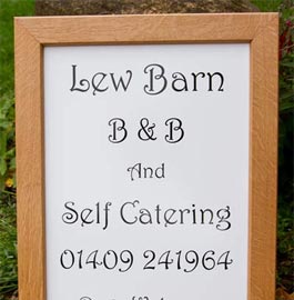 Sign with a wooden Frame