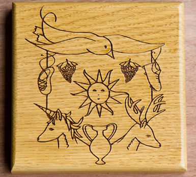 Customers artwork laser engraved onto oak plaque.
